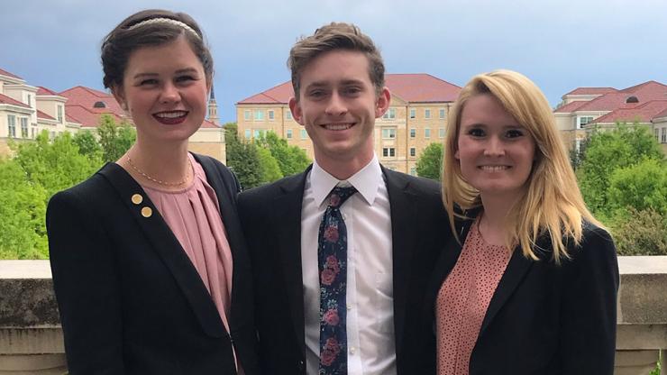 Biomedical engineering students Rachel Mann, left, Jared Brown and Bailey Eaton designed a device that simplifies the suturing r