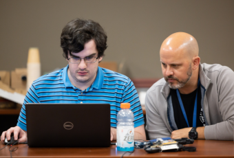 Chris Roberts (right), a GTRI principal research engineer who leads CIPHER's Embedded Cyber Techniques branch, said hackathons a