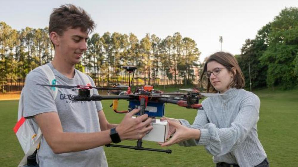 Catherine Heaton (right) is a fourth-year aerospace engineering major who has participated in Experimental Flights since fall 2020. Heaton said she enjoys working with a diverse group of students to solve real-world issues (Credit: Christopher Moore, GTRI).